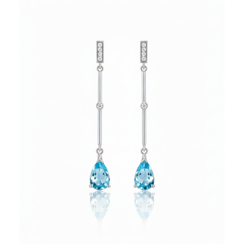 Brinco Topázio azul com zircônia.