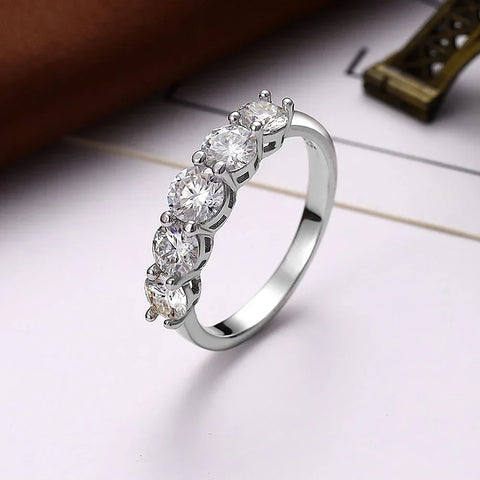 Meia Aliança em prata .925 e 4mm moissanite