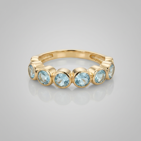 Meia aliança de topázio azul